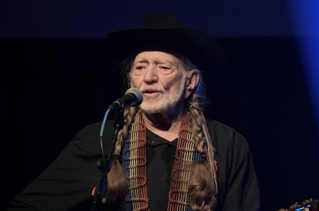 Willie Nelson performs at the Producers & Engineers Wing 12th Annual GRAMMY Week Celebration at the Village Studio on Wednesday, Feb. 6, 2019, in Los Angeles. (Photo by Richard Shotwell/Invision/AP)